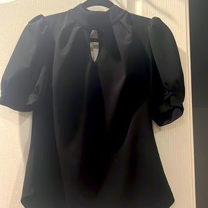 Black top with puffy sleeves